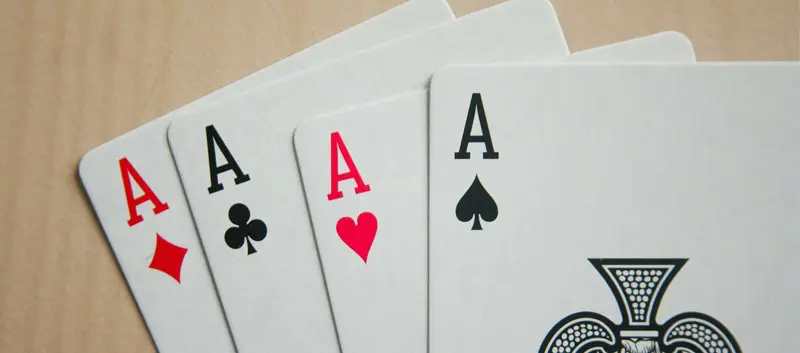 Image of the four aces from a deck of cards.