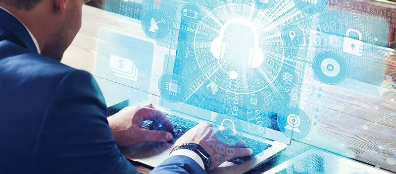 Man using a laptop.