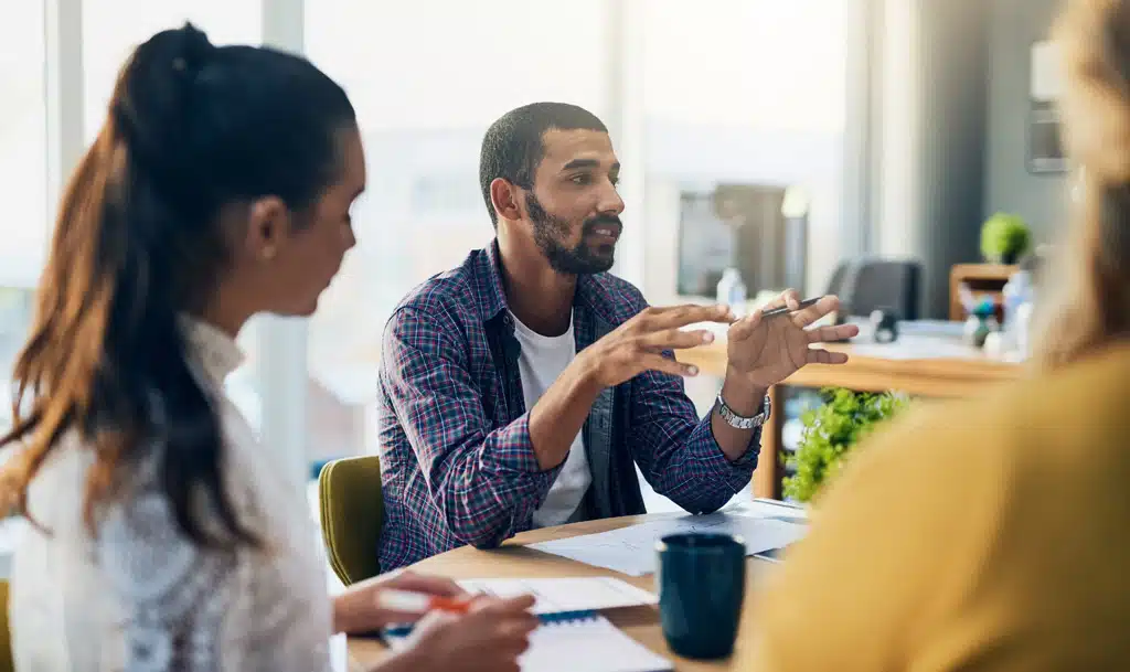 Marketing team discussing how to increase leads.