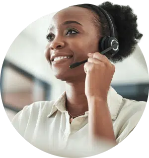 Lady wearing a headset talking to a customer.