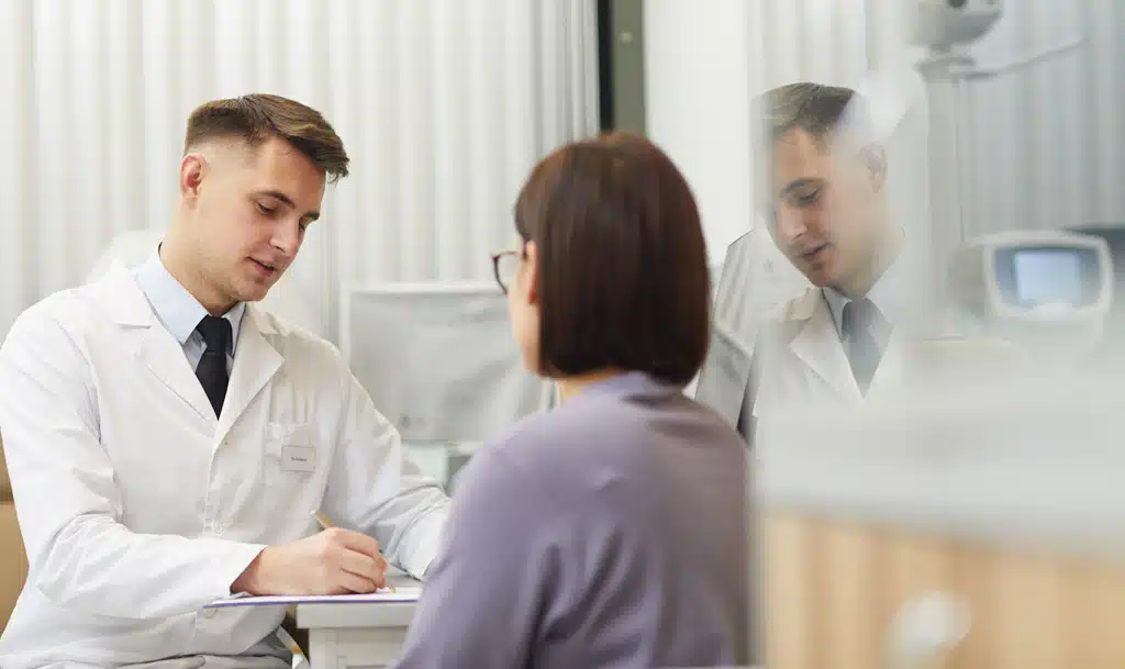 Doctor talking to a patient.