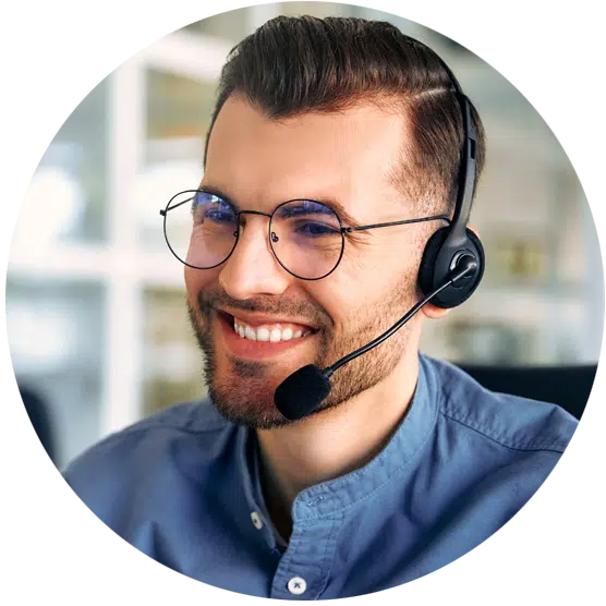 Man wearing a headset talking to a person on the phone.